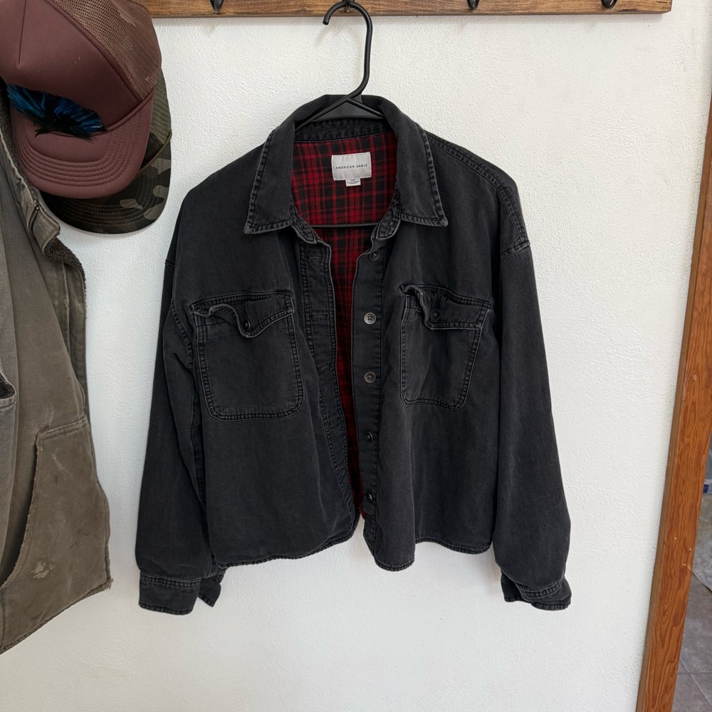 American Eagle Outfitters Distressed Black Jacket with Red Plaid Interior